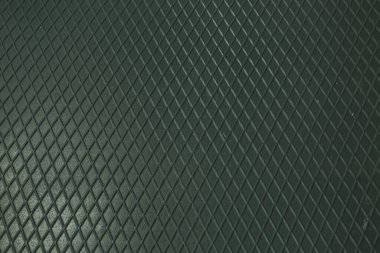 Siyah metal desenli çelik arka plan. Delinmiş metal levha.