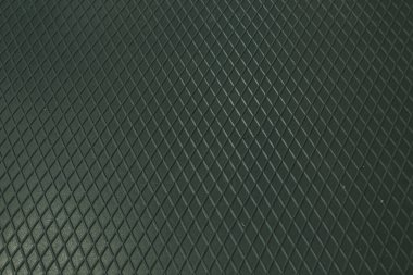 Siyah metal desenli çelik arka plan. Delinmiş metal levha.