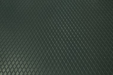 Siyah metal desenli çelik arka plan. Delinmiş metal levha.