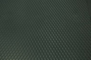 Siyah metal desenli çelik arka plan. Delinmiş metal levha.