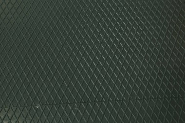 Siyah metal desenli çelik arka plan. Delinmiş metal levha.