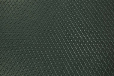 Siyah metal desenli çelik arka plan. Delinmiş metal levha.