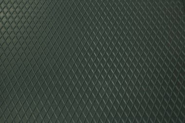 Siyah metal desenli çelik arka plan. Delinmiş metal levha.