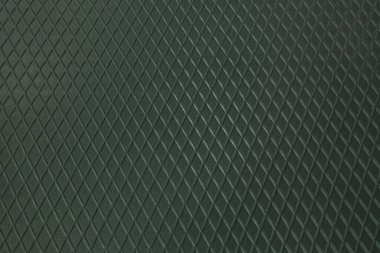 Siyah metal desenli çelik arka plan. Delinmiş metal levha.