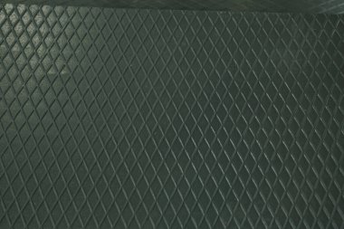 Siyah metal desenli çelik arka plan. Delinmiş metal levha.