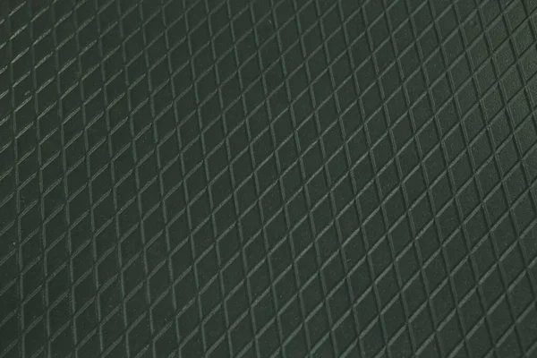 Siyah metal desenli çelik arka plan. Delinmiş metal levha.