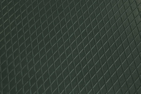 Siyah metal desenli çelik arka plan. Delinmiş metal levha.