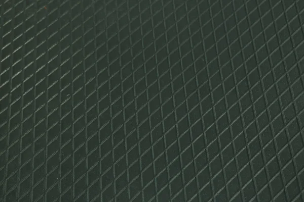 Siyah metal desenli çelik arka plan. Delinmiş metal levha.