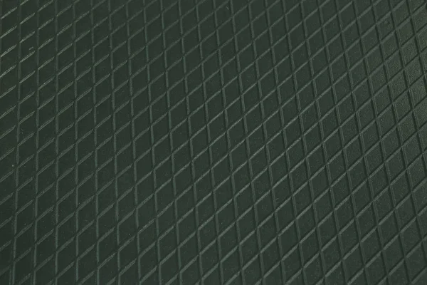 Siyah metal desenli çelik arka plan. Delinmiş metal levha.