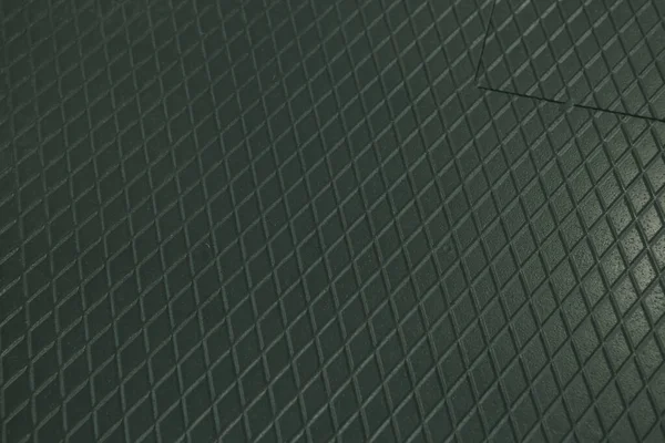 Siyah metal desenli çelik arka plan. Delinmiş metal levha.