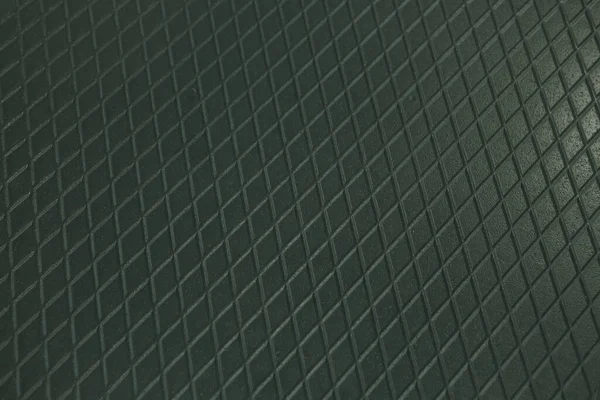 Siyah metal desenli çelik arka plan. Delinmiş metal levha.