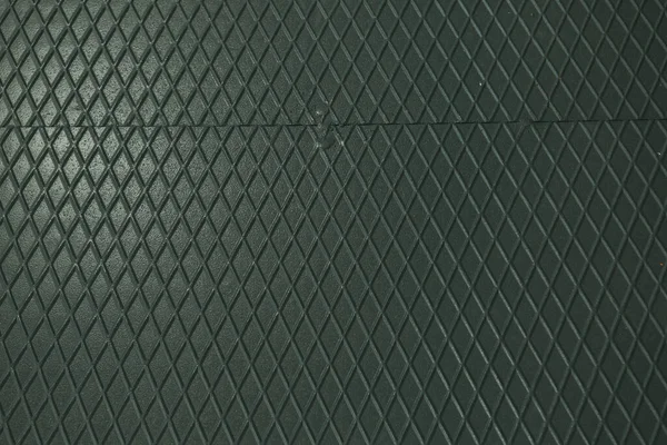 Siyah metal desenli çelik arka plan. Delinmiş metal levha.