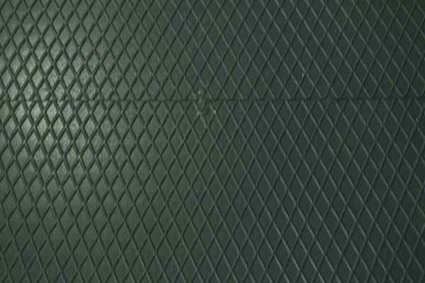 Siyah metal desenli çelik arka plan. Delinmiş metal levha.