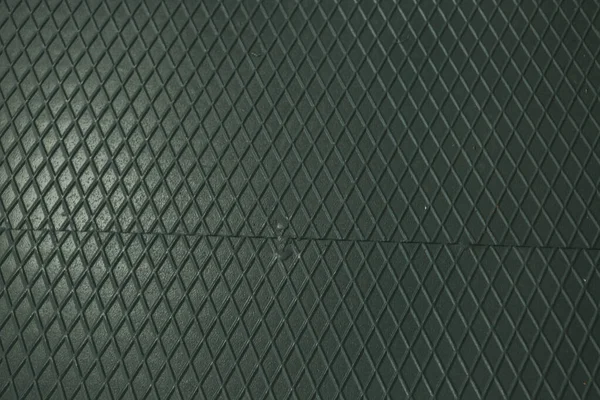 Siyah metal desenli çelik arka plan. Delinmiş metal levha.