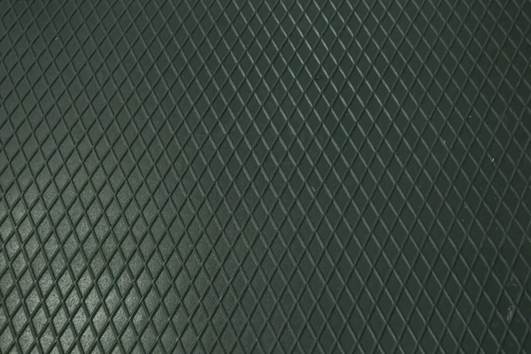 Siyah metal desenli çelik arka plan. Delinmiş metal levha.