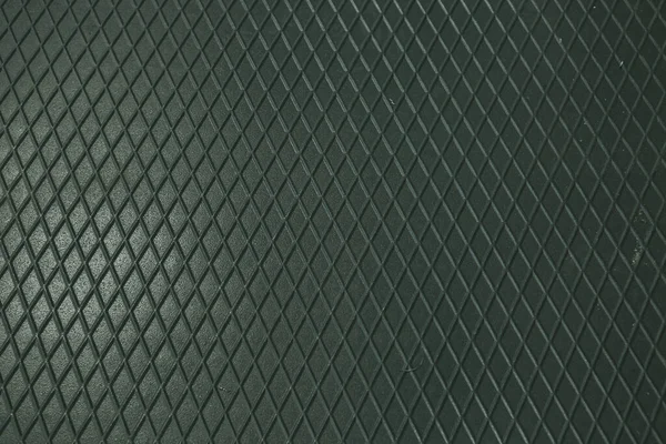 Siyah metal desenli çelik arka plan. Delinmiş metal levha.