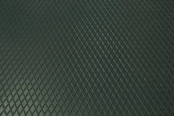 Siyah metal desenli çelik arka plan. Delinmiş metal levha.