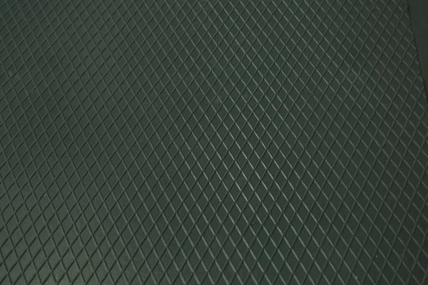 Siyah metal desenli çelik arka plan. Delinmiş metal levha.