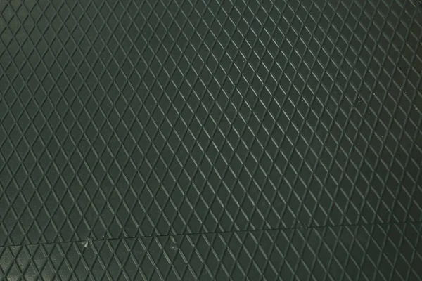 Siyah metal desenli çelik arka plan. Delinmiş metal levha.