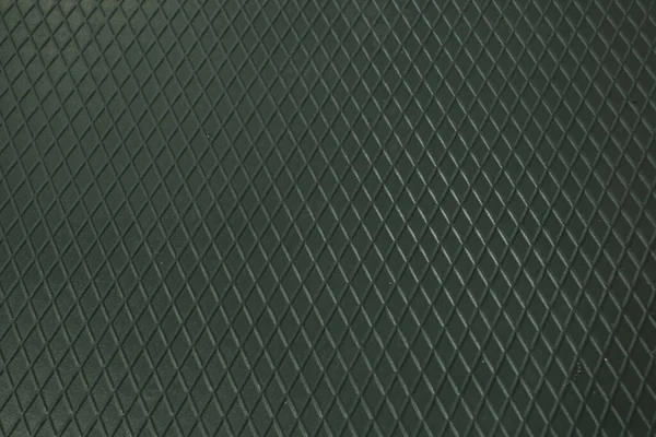 Siyah metal desenli çelik arka plan. Delinmiş metal levha.