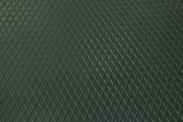 Siyah metal desenli çelik arka plan. Delinmiş metal levha.