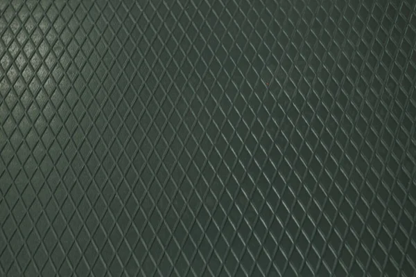 Siyah metal desenli çelik arka plan. Delinmiş metal levha.