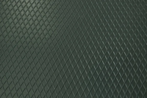 Siyah metal desenli çelik arka plan. Delinmiş metal levha.