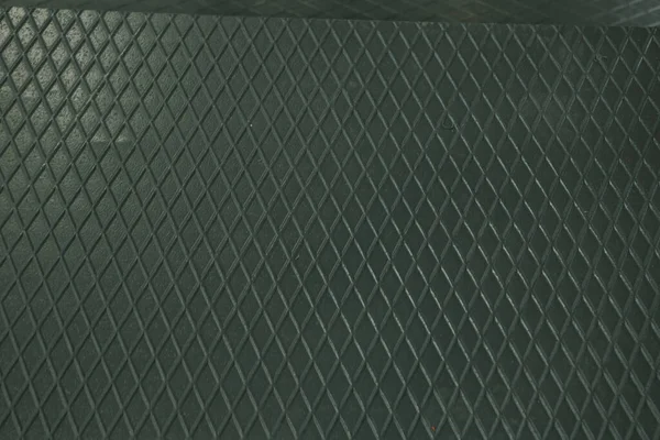 Siyah metal desenli çelik arka plan. Delinmiş metal levha.