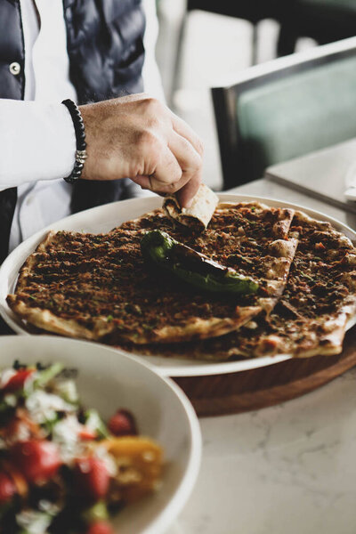 Traditional turkish baked dish pide. Turkish pizza pide, Middle eastern appetizers. Turkish cuisine. Pide with meat filling