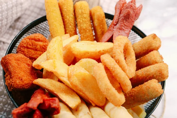 Delicious Snack Plate French Fries Onion Rings Spring Rolls Sausages — Stock Photo, Image