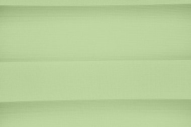 Yeşil kumaş, soyut pembe arkaplan