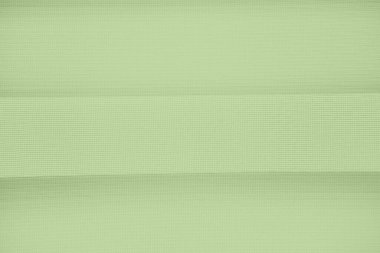 Yeşil kumaş, soyut pembe arkaplan