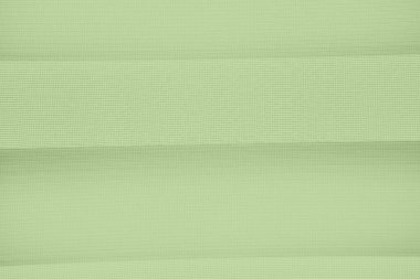 Yeşil kumaş, soyut pembe arkaplan