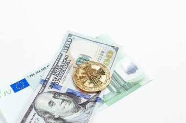 Euro banknotları, ABD doları ve bitcoin para