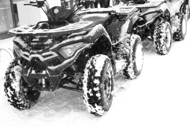 helmet sitting on atv quad bike in mountains