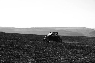 helmet sitting on atv quad bike in mountains