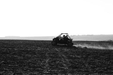 helmet sitting on atv quad bike in mountains