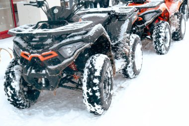 helmet sitting on atv quad bike in mountains