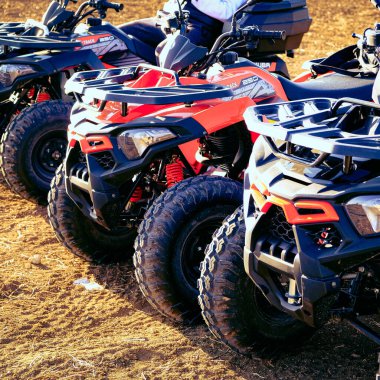 helmet sitting on atv quad bike in mountains