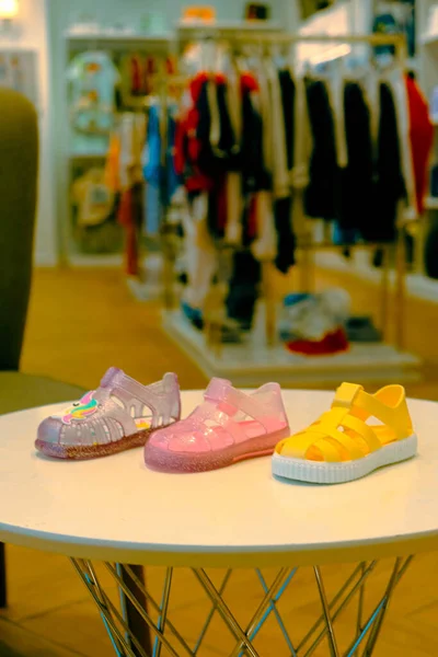 children's slipper and shoes on the shelf in the store