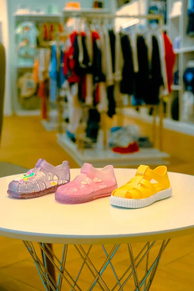 children's slipper and shoes on the shelf in the store