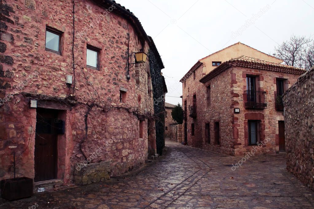 Streets of the historical town of Medinaceli in Soria, Spain. Historic town with a large number of monumental buildings that is now commonly visited by tourists.
