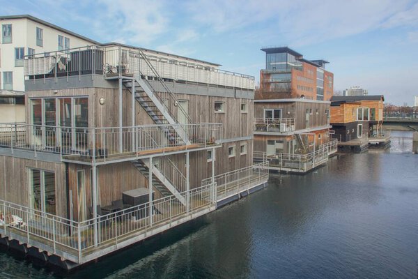 Malmo, Sweden; 02 15 2016. Floating houses in Vastra Hamnen, an innovative and modern district in Malmo. Modern and futuristic design of the houses by the sea.