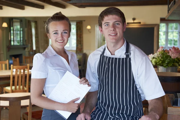 Portrait Of Chef And Waitress In Restaurant — Stock Photo, Image