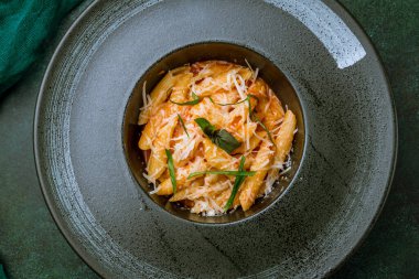 Pasta Penne arabiata food background