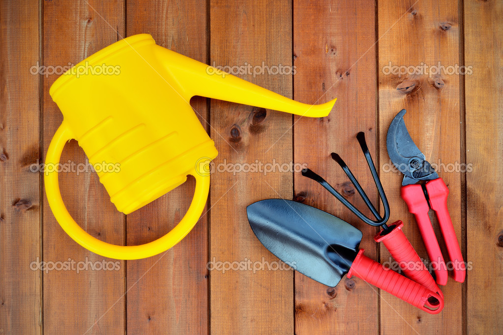 Gardening Tools And Objects On Old Wooden Background Stock Photo Gardening Tools And Objects On Old Wooden Background Stock Photo