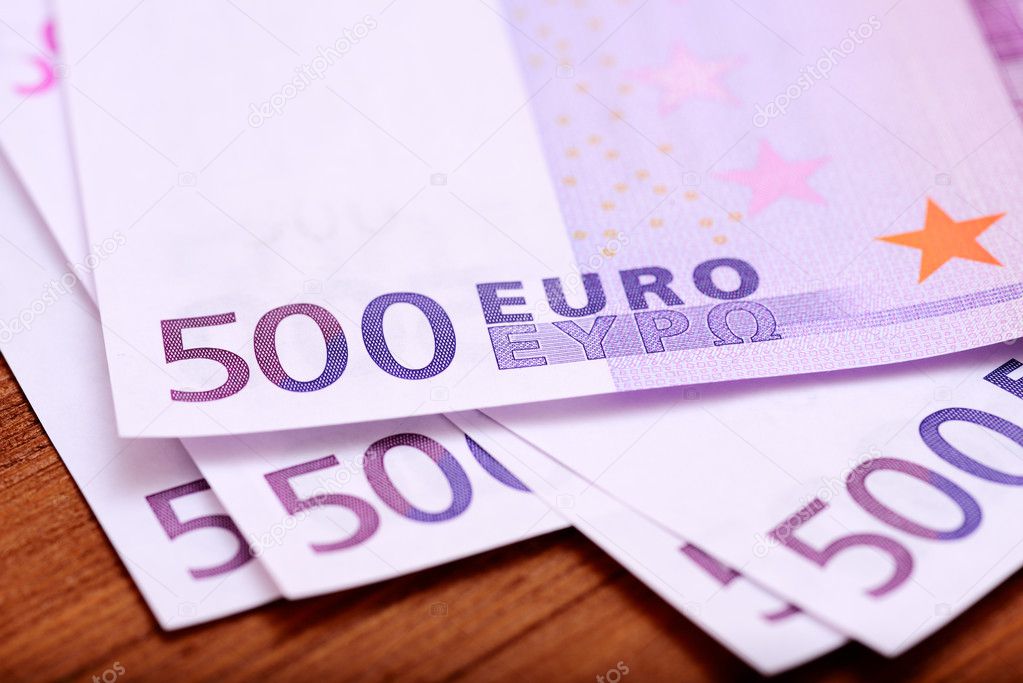 Europian currency euros banknotes on wooden table