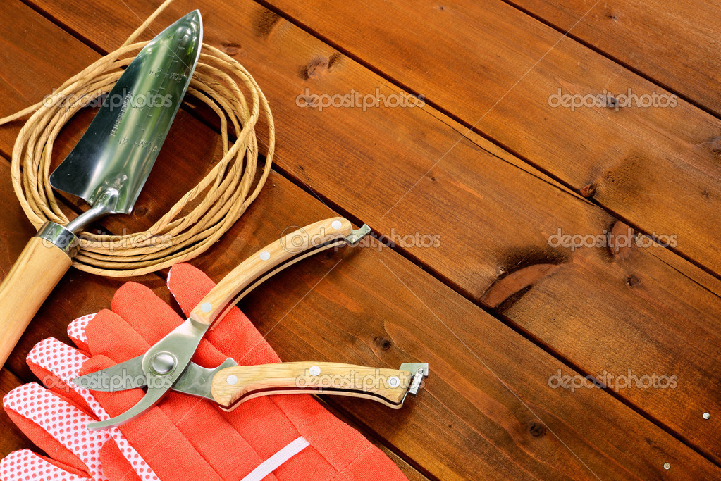 Close Up Gardening Tools And Objects On Old Wooden Background With Close Up Gardening Tools And Objects On Old Wooden Background With Copyspace Photo By Olganiki