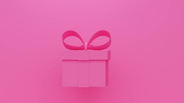 Fondo rosa con una apertura de regalo. Diseño de movimiento moderno mínimo. — Vídeo de stock