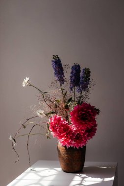 photo of a bouquet created from wild fresh spring flowers photographed on a white background in daylight, flowers for cut out white background